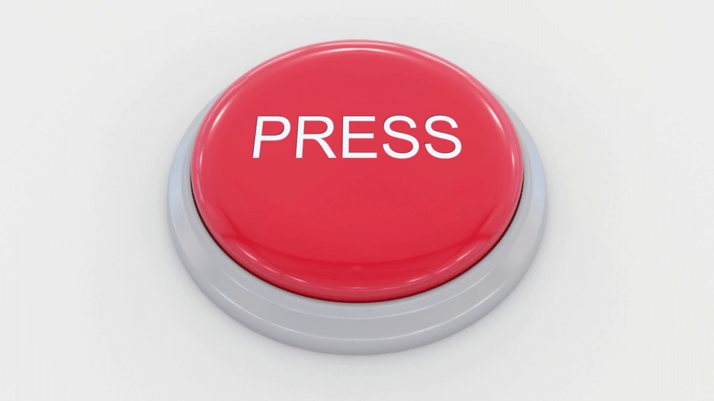 Picture of a big red button with "Press" printed on it.